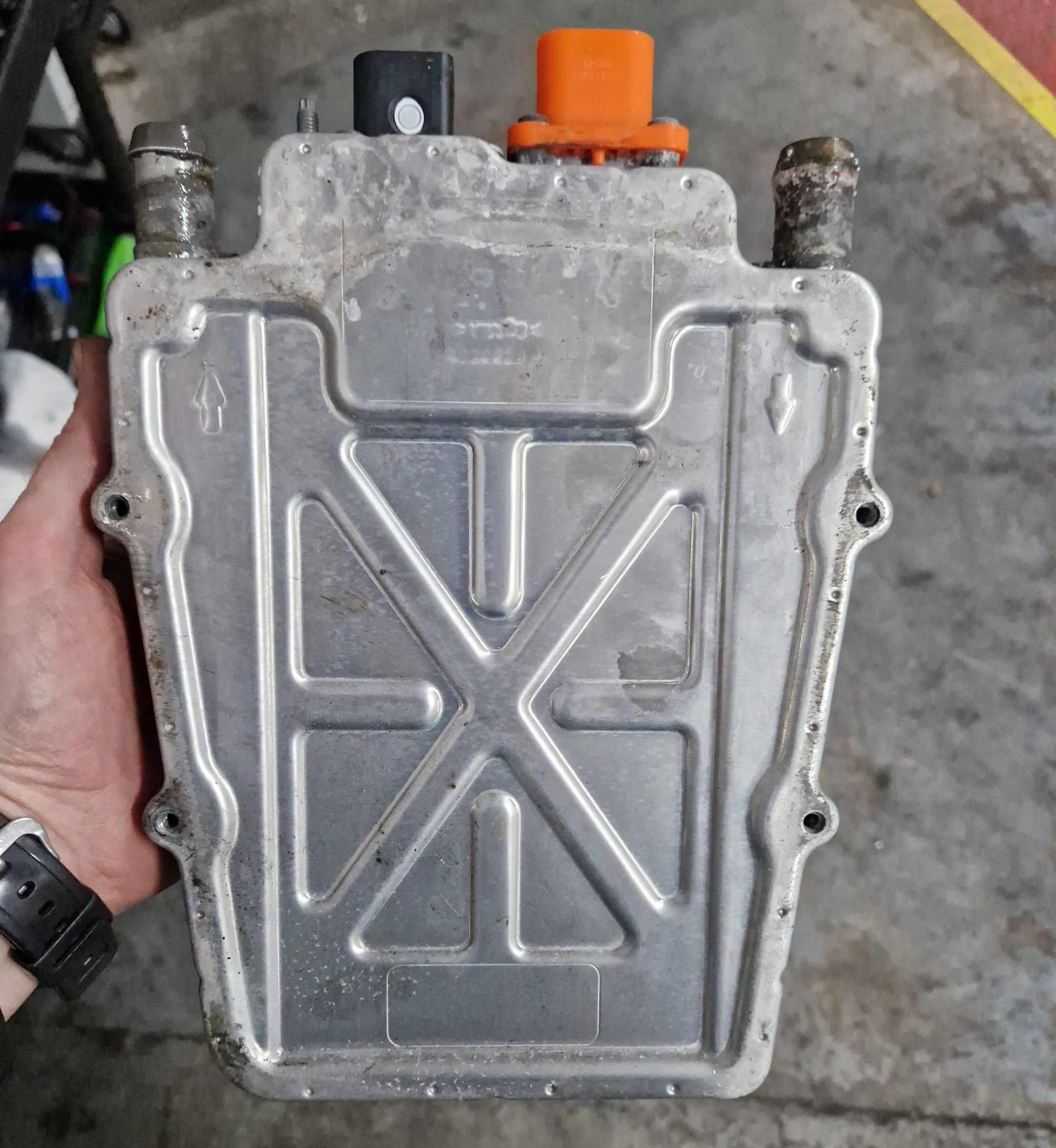 Failed high-voltage coolant heater removed from a Range Rover Evoque PHEV